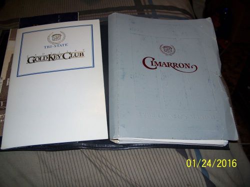 A owners manual&amp;other manuals for a 1988 cadillac cimarron vinyl case