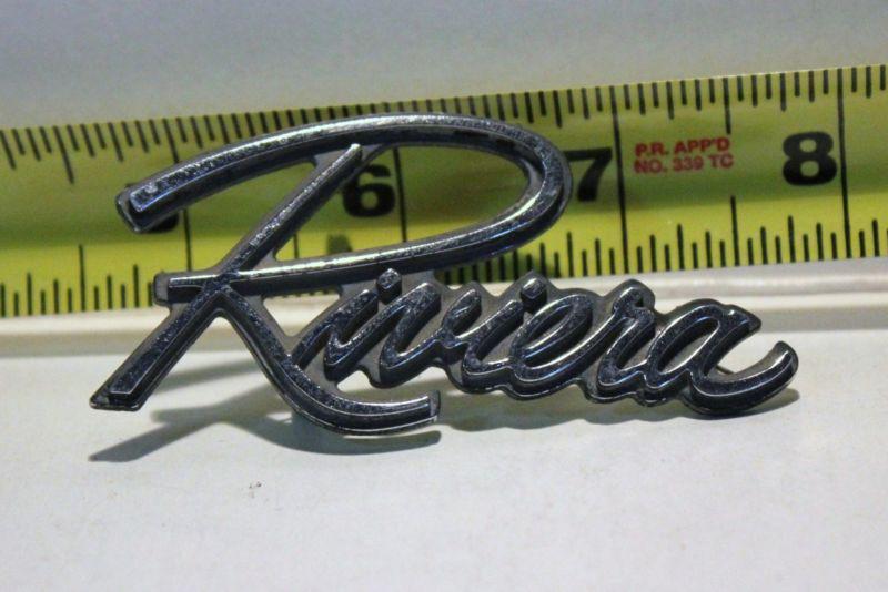 Old car emblem riviera removed from junked car many years ago