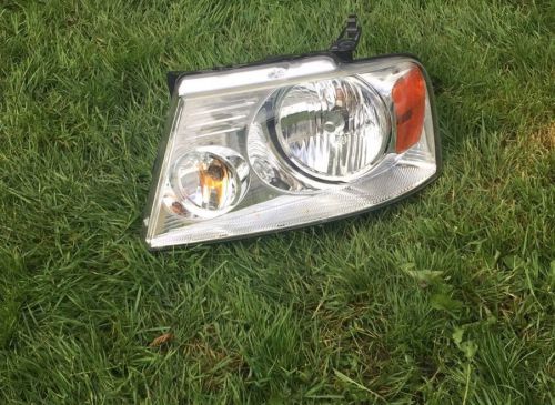 2004- 2008 ford f150 left headlight (driver&#039;s side) - oem original