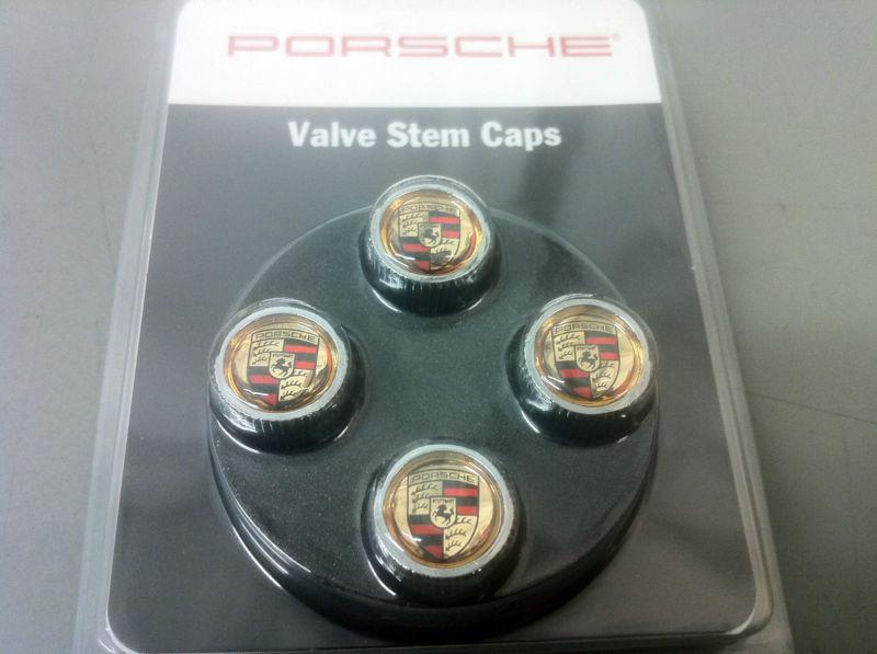 Porsche valve stem caps black, red, and gold