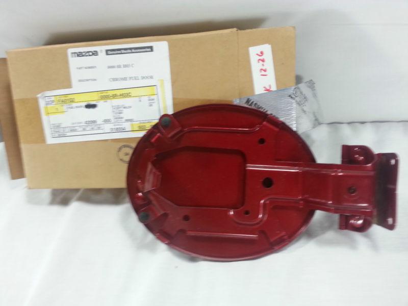 Find Mazda Chrome Fuel Door Part Number 00008RH03C NEW!!! Genuine
