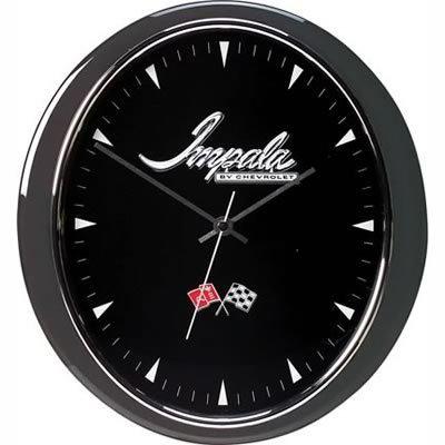 Wall clock oval metallic black/silver bezel glass lens aa batteries impala logo