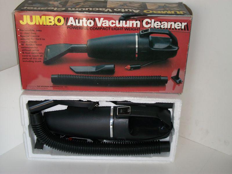 "jumbo" 12v auto vacuum w/4 attachments works
