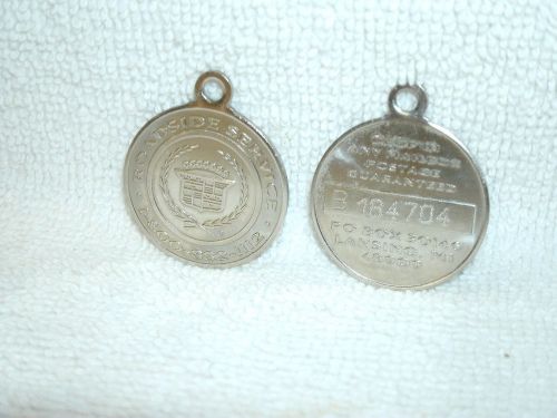 Cadillac " silver  " key chain disc"- 1990's  gold key delivery-original -used