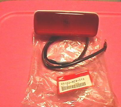 X51 88 89 90 91 92 93 94 trx300 2x4 &amp; 4x4 trx300fw tail light oe# 33700-hc4-010