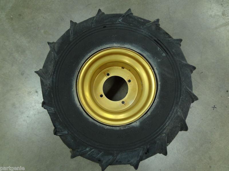 Honda gold rim with dick cepek 16 paddle 21x12x8 atv wheel & sand tire