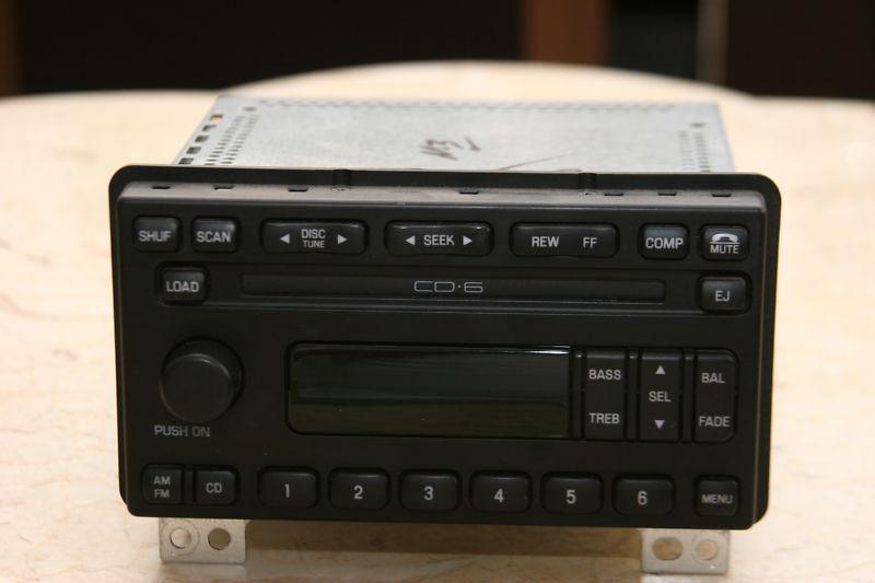 Sell NO RESERVE FORD IN DASH RADIO SIX CD CHANGER STOCK Flawless in