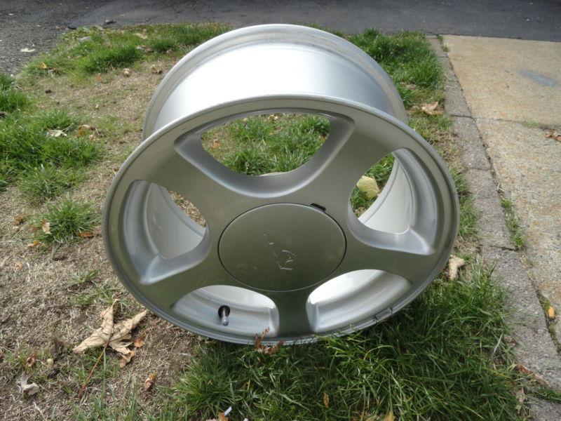 2003  ford mustang wheel 16 x 7-1/2 silver sparkel factory wheel - painted type