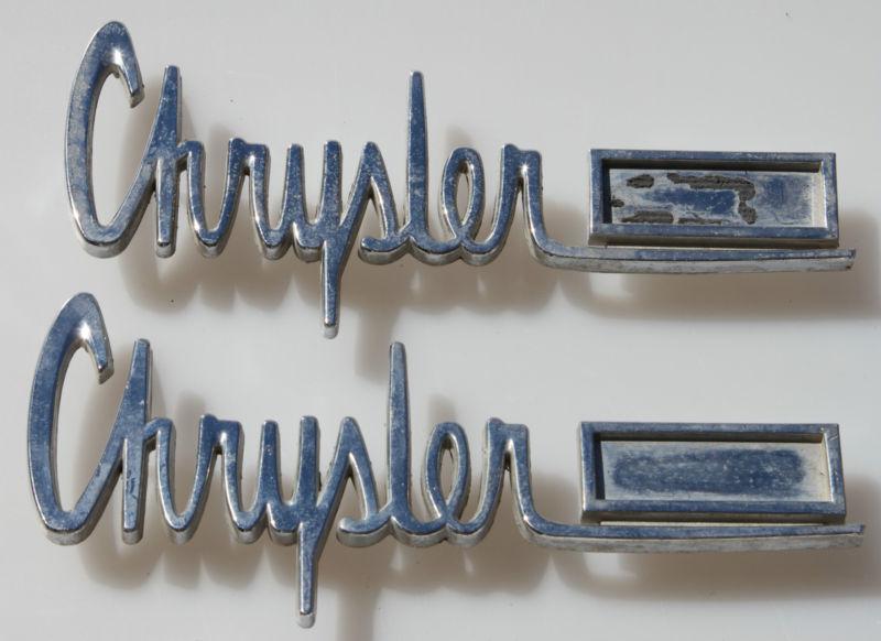 Two chrysler emblems script vintage 7 3/4" long