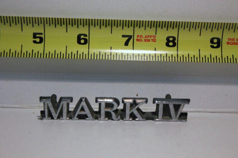Old car emblem " mark 4 "  removed from junked car many years ago
