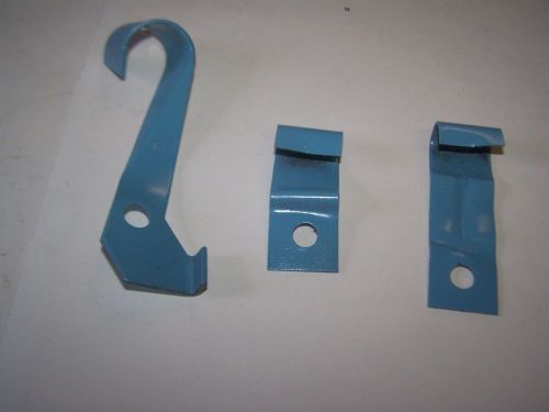 Three early '60's oem pontiac v8 block mounted cable/wire brackets