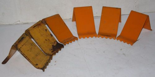 Lot of 6 steel wheel chocks (4) wheel chocks marked "nissan"