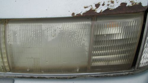 1991 mercury station wagon front headlight lh