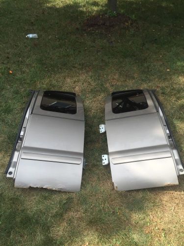 2002 f250xl 7.3 left and right rear doors with windows and speakers