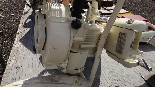Vintage 1960 clinton outboard motor complete with original manual