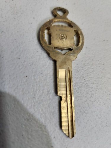 Vintage cadillac gold plated crest 's'  key blank