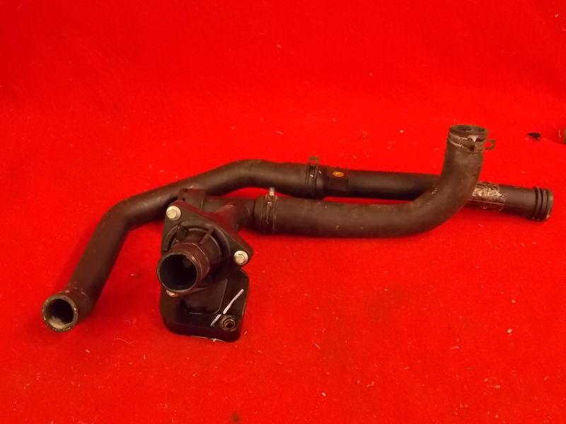 Purchase JAGUAR XType V6 upper radiator hose with thermostat. Fits