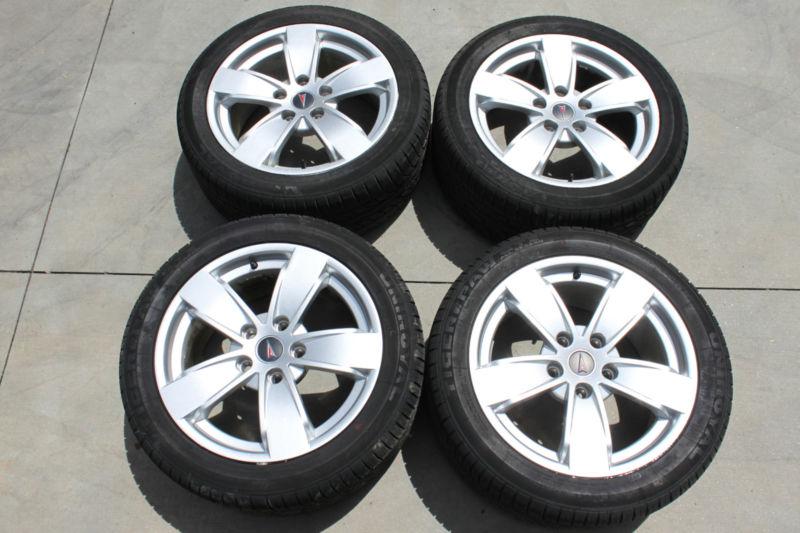 04-06 gto 17x8 silver wheels w/ uniroyal 245 tires used oem 92159045