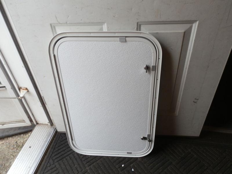 Rv cargo door r.o. 28" tall x 18" wide x 3/4" thick rough white
