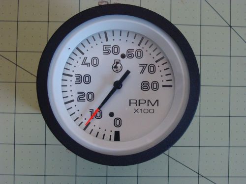 Lite blue automobile tachometer