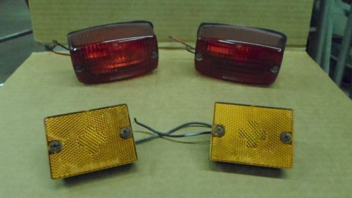2 tail and brake lights,with 2 marker lights,used,plastic,working,very usable,
