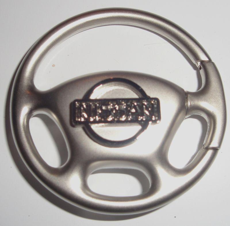Key ring with nissan logo