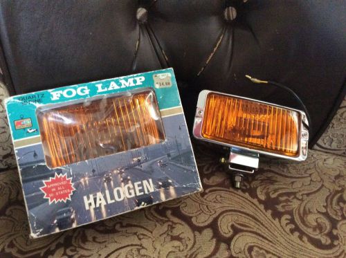 Vintage  nos quartz iodine halogen fog lamps 1 in original box, 1 new no box