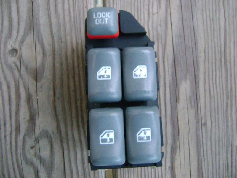 Find 19972003 PONTIAC GRAND PRIX MASTER WINDOW SWITCH 4 DOOR OEM in