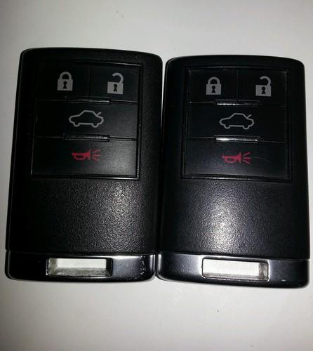 Cadillac key fobs pair