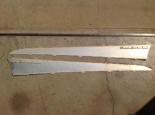 1957 chevy belair quarter fins and moldings.  "no reserve" (local pick up only)