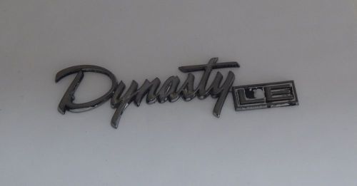 88-93 dodge dynasty le rear oem nameplate script emblem