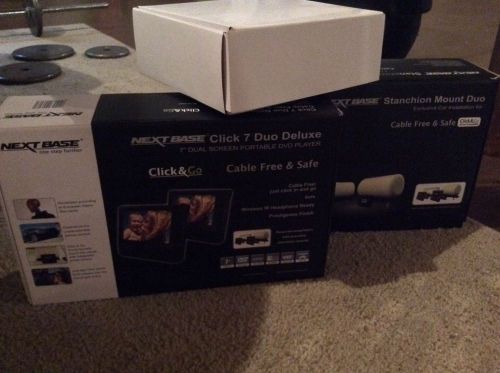 Next base click 7 duo deluxe 7&#034; dual dvd players w/ mounting kit &amp; 2 headphones