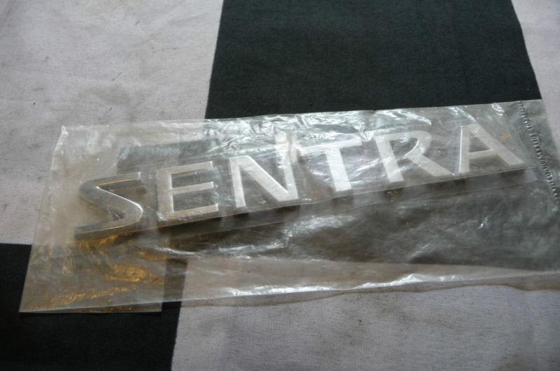 2004-2006 nissan sentra nameplate logo 84895-6z500 oem oe