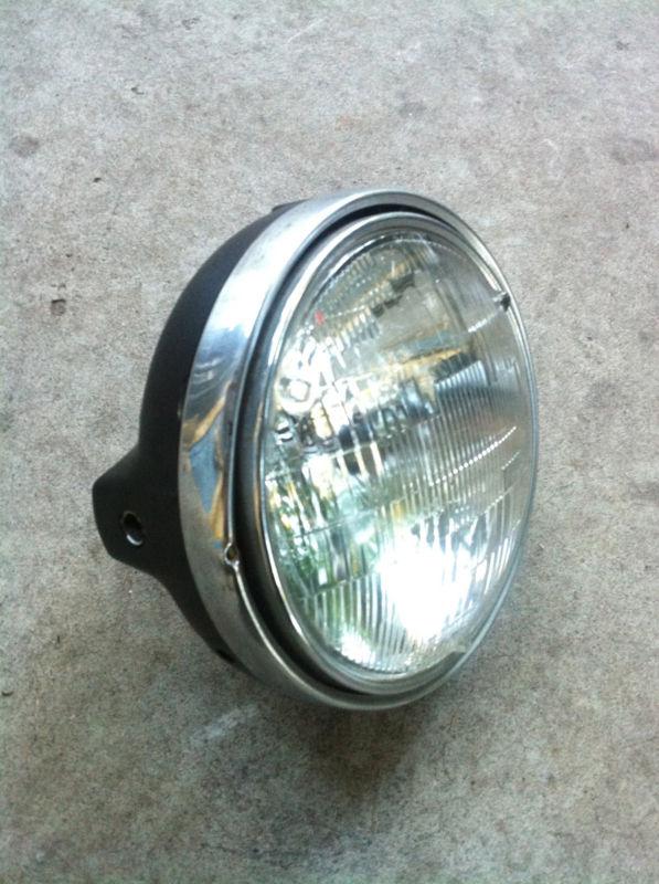 Complete honda cb750 four headlight assembly - hm-32m-s - chrome trim and bulb!