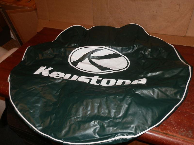 Sell RV GREEN TIRE COVER SAYS KEYSTONE IN THE MIDDLE in Bronson