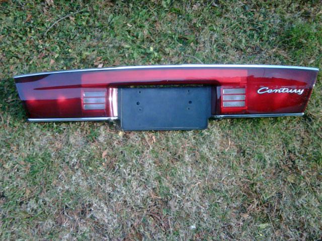 2000 01 02 03 04 05 century tail light trunk center or lid mtd century 2000 emb.