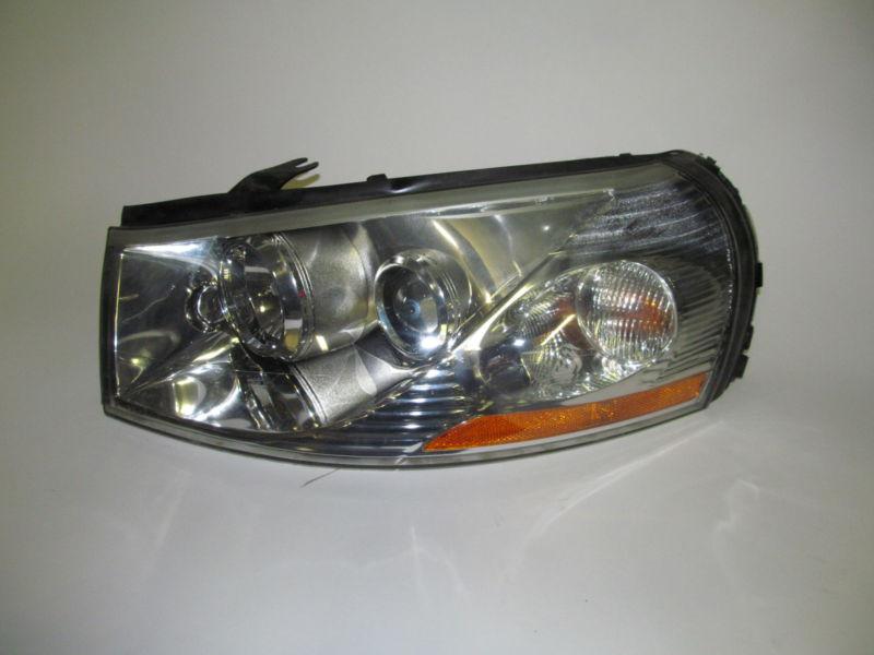 03 04 05 saturn l300 sedan oem left headlight nice!
