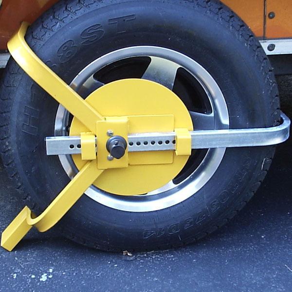 Denver wheel boot lock towing parking enforcement for tractors vehicles trailers