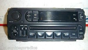 02-06 dodge caravan durango radio cd face plate control panel p05064354ai