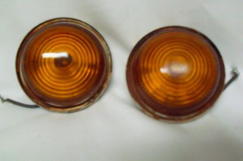 Vintage pair of round amber glass lens car truck lights