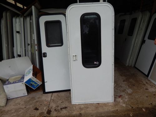 Trailer door, 30" x 70".  with screen door, frame, locks &amp; keys, new door #39