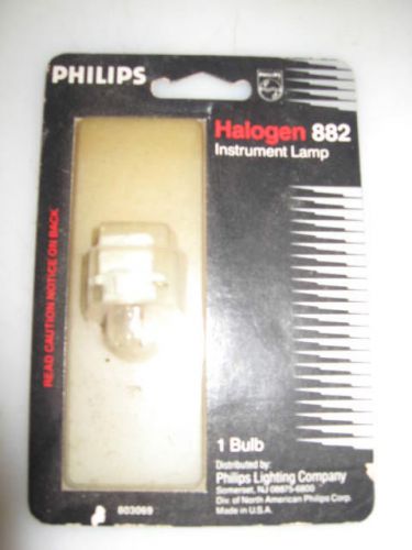 One (1), 12.8 volt halogen instrument light bulb, philips # 882