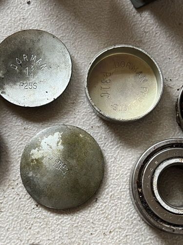 Auto parts lot dorman freeze expansion plugs thermometers wheel bearing switch