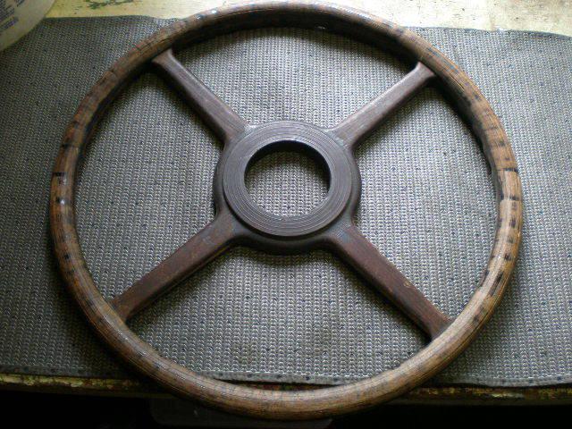 Wooden steering wheel in great condition may be a truck piece