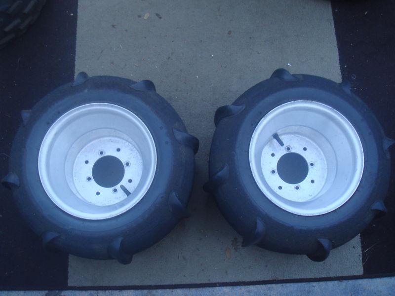 Honda trx wheels and tires front and rear paddles