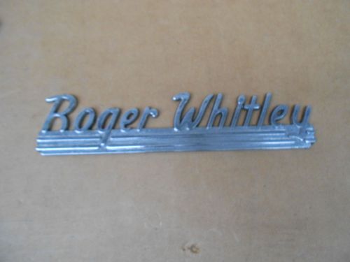 Vintage roger whitley car dealer dealership metal emblem