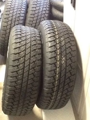 5 bridgestone dueler a/t p255/70/18 112s m+s tires