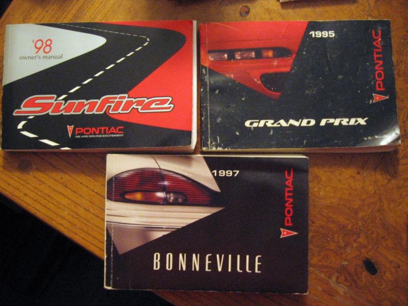 Assortment of pontiac owner's  manuals sunfire, bonneville, grand prix