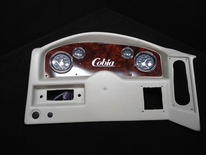 Cobia fishing boat steering console dash with gauges