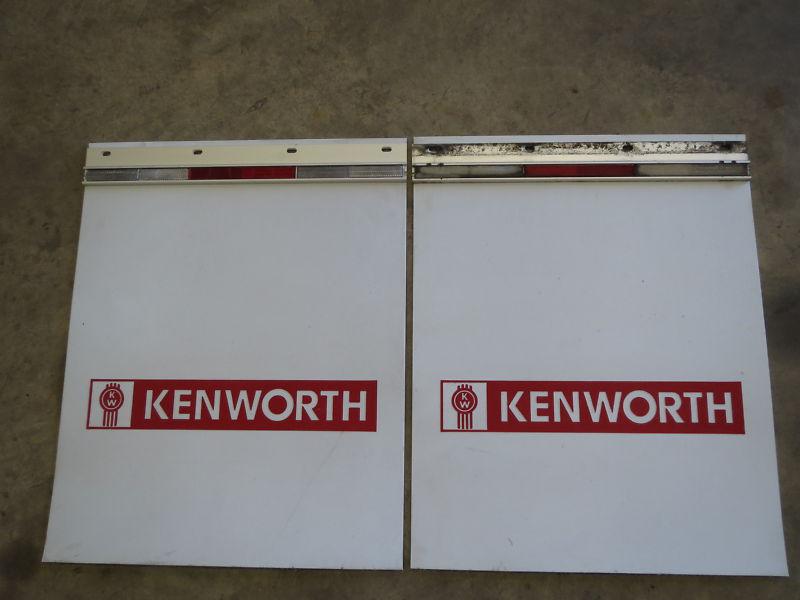 Set of kenworth mud flaps w/ top refletor plates used 